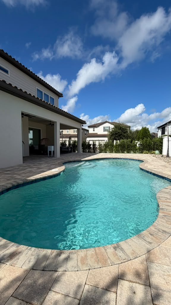 Freeform pool with covered lanai, Central Florida home
